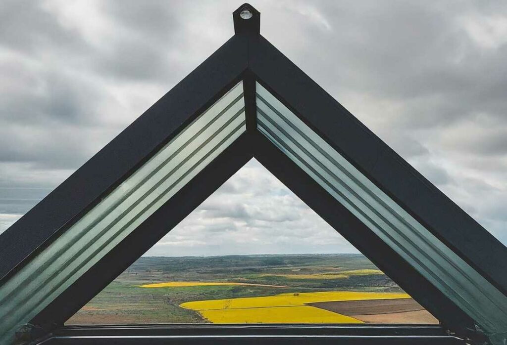 A PVC roof with a countryside background.