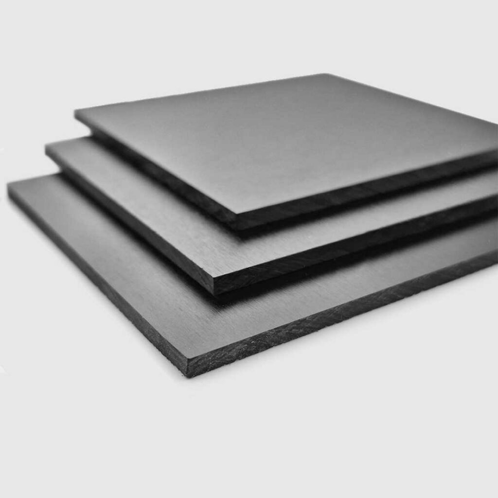 Stacked sheets of black trovidur pvc sheets.