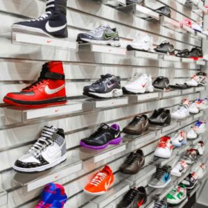 A slat wall shoe display made from PVC panels.