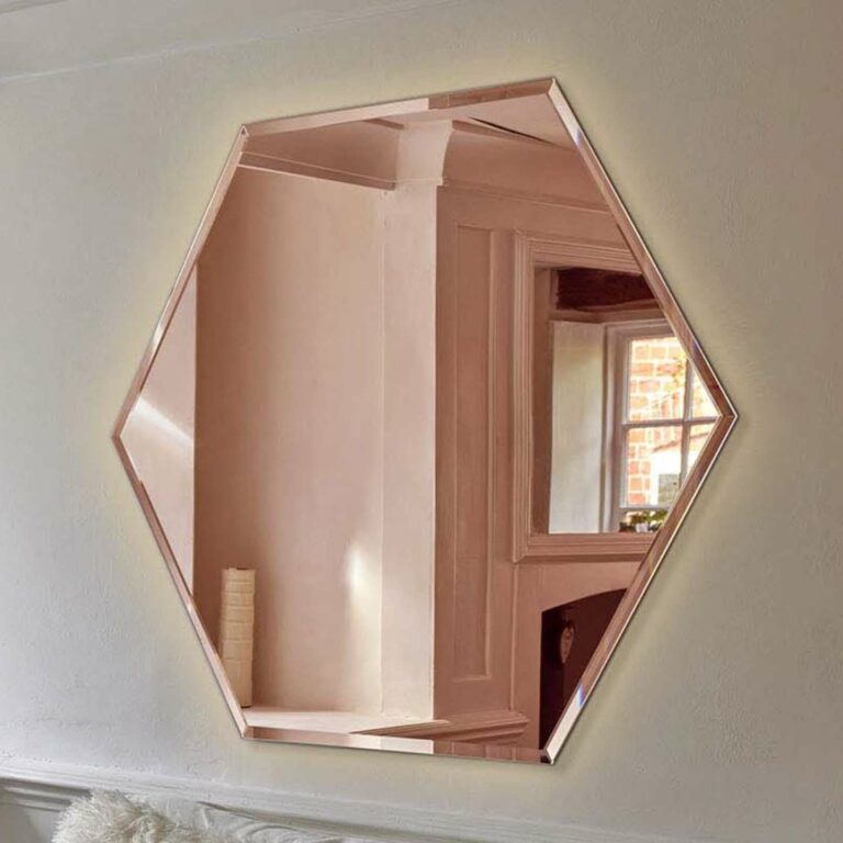 A house mirror made from rose gold mirrored sheet.