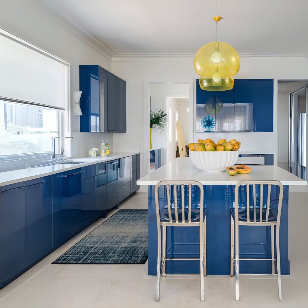 Kitchen with blue perspex cupboard doors.