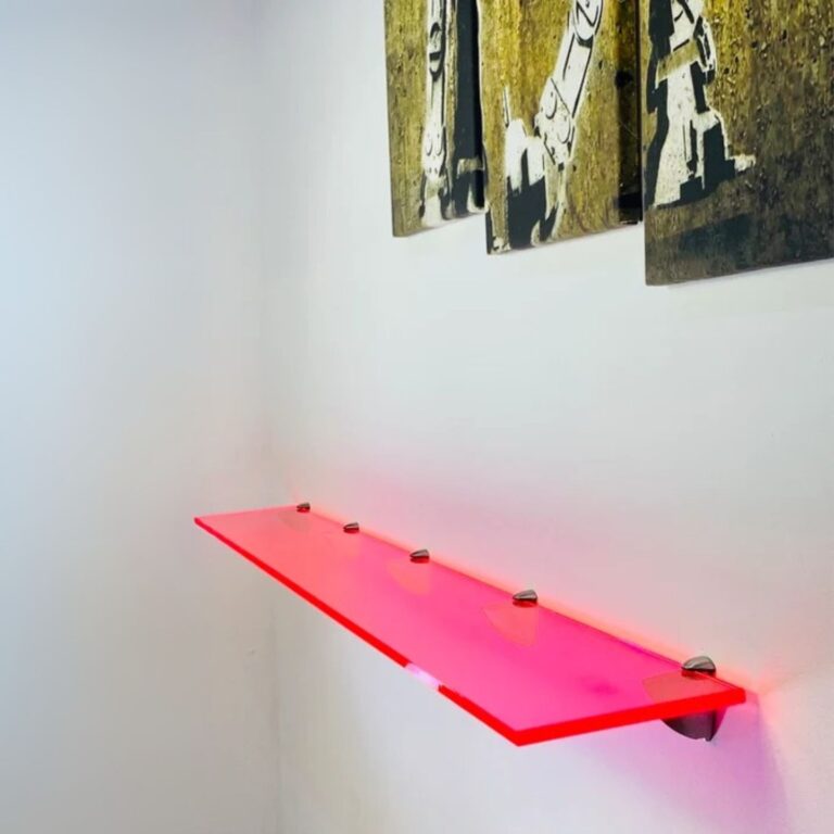 A shelf made from fluorescent perspex acrylic.