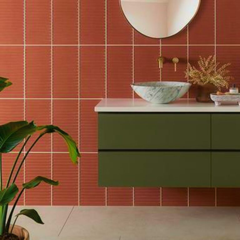 Bathroom cabinet made from dark green matte perspex.