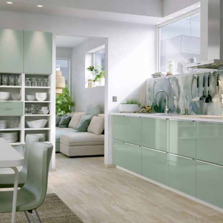 A pastel coloured kitchen with Perspex cabinets and cupboards.