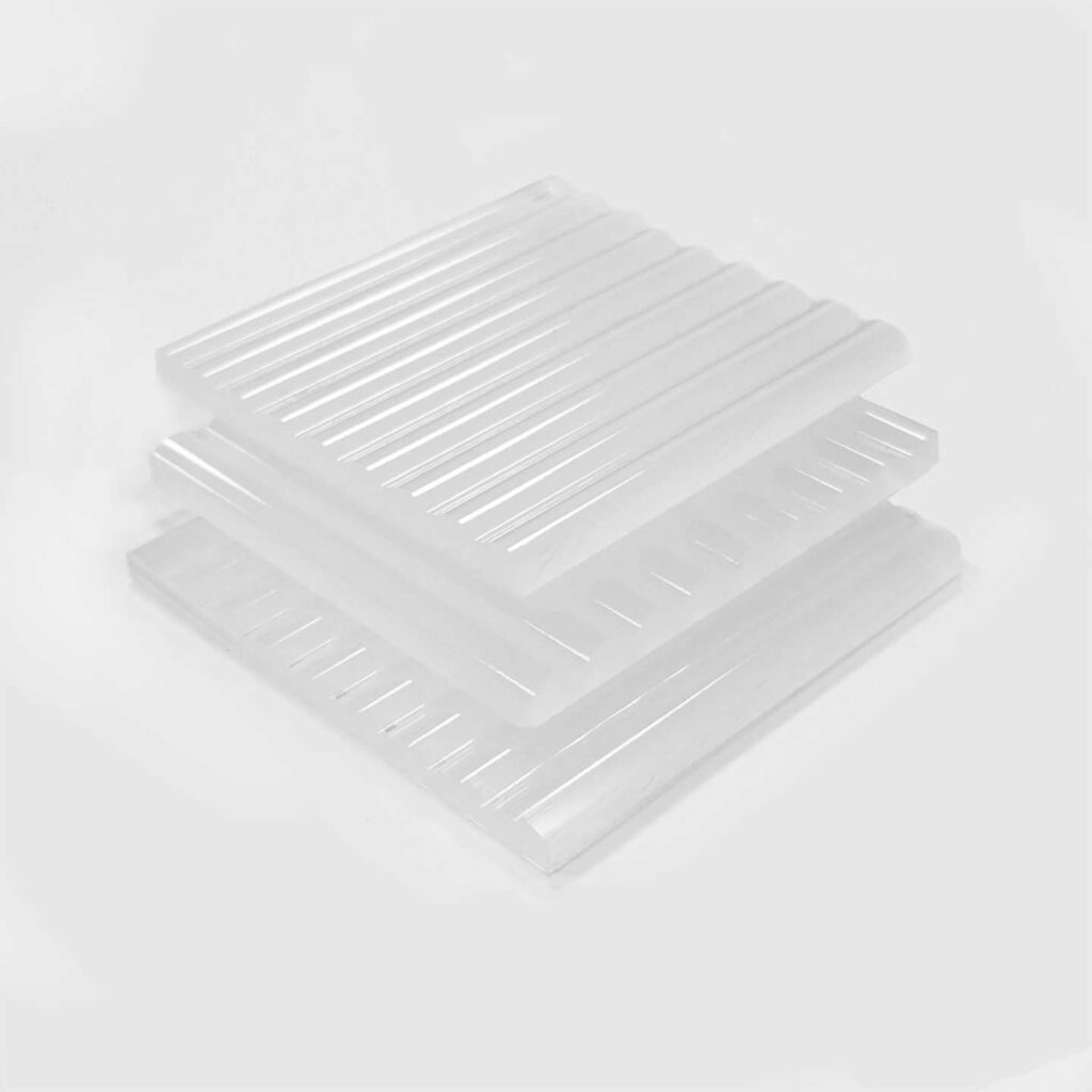 stacked opal reeded acrylic sheets.