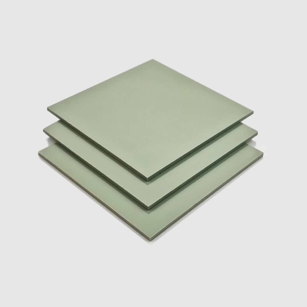 A stack of sage green plastic PVC sheets.