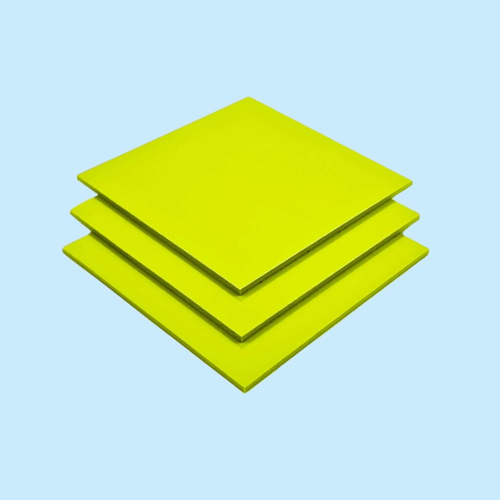 Stacked lime green PVC sheets.