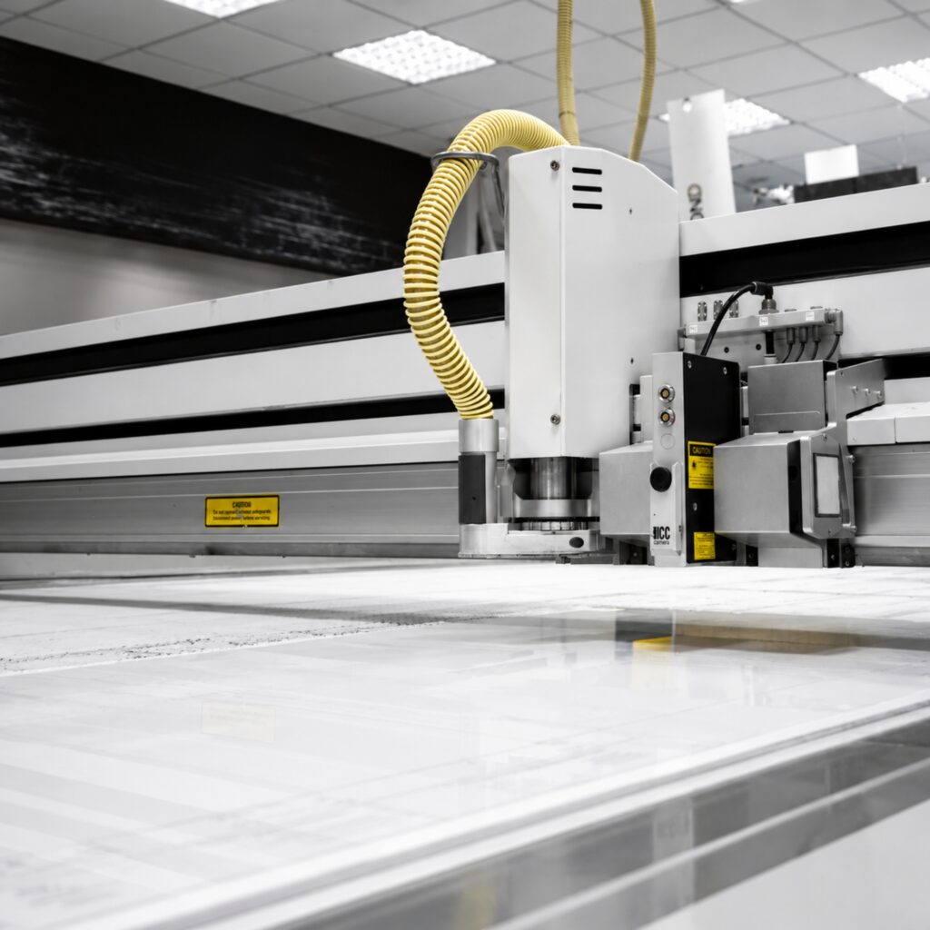 An industrial CNC machine in action.