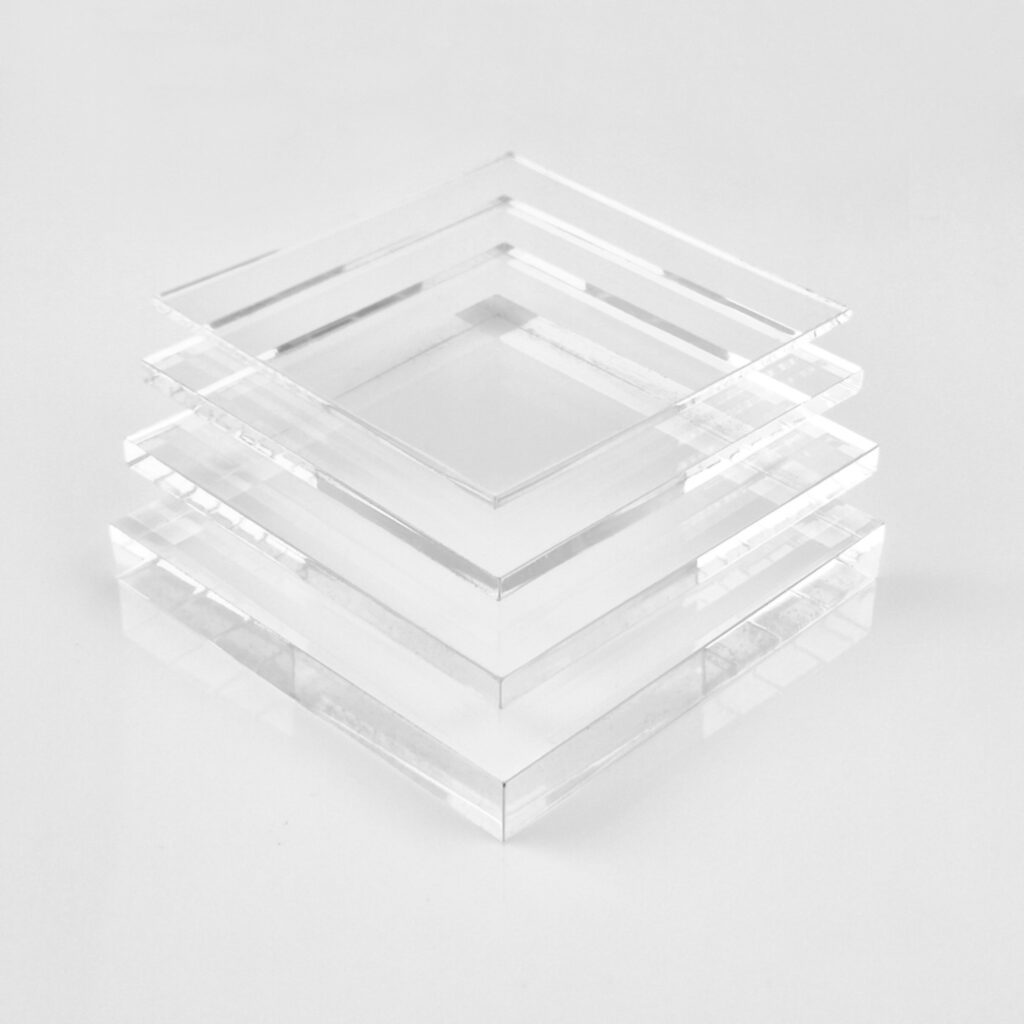 Stacked sheets of clear acrylic.